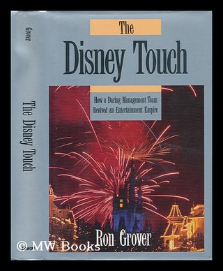 Item #24171 The Disney Touch - How a Daring Management Team Revived an Entertainment Empire. Ron...