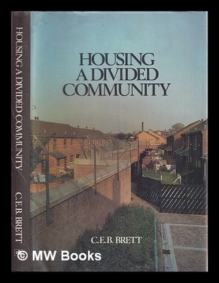 Item #327108 Housing a divided community / C.E.B. Brett. Charles Edward Bainbridge Brett